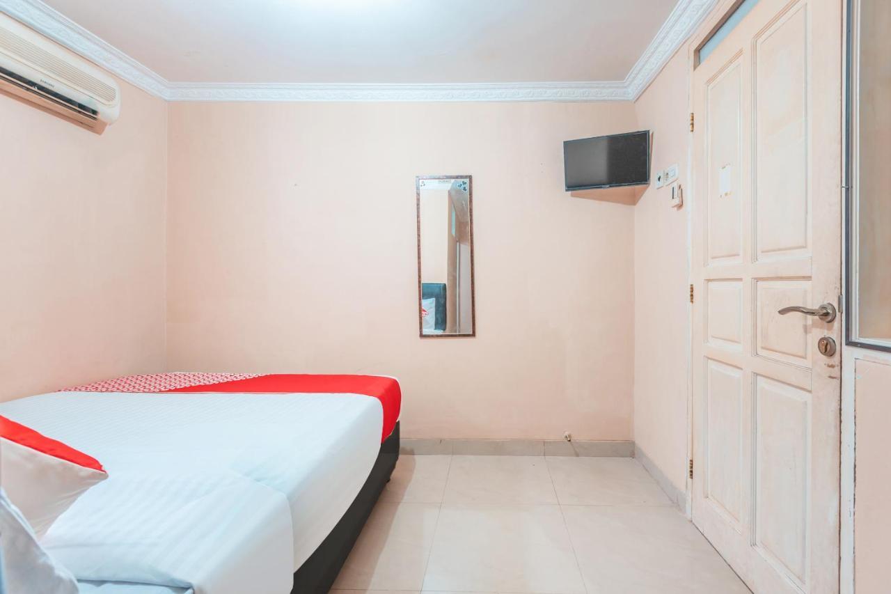 Oyo 2765 Mulia Raja Hotel Tangerang Bagian luar foto