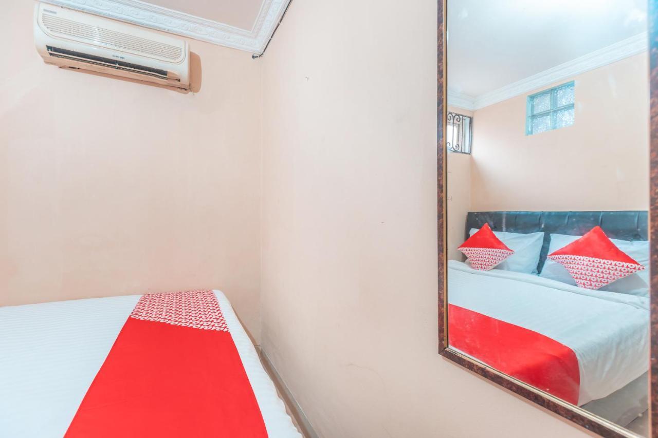 Oyo 2765 Mulia Raja Hotel Tangerang Bagian luar foto